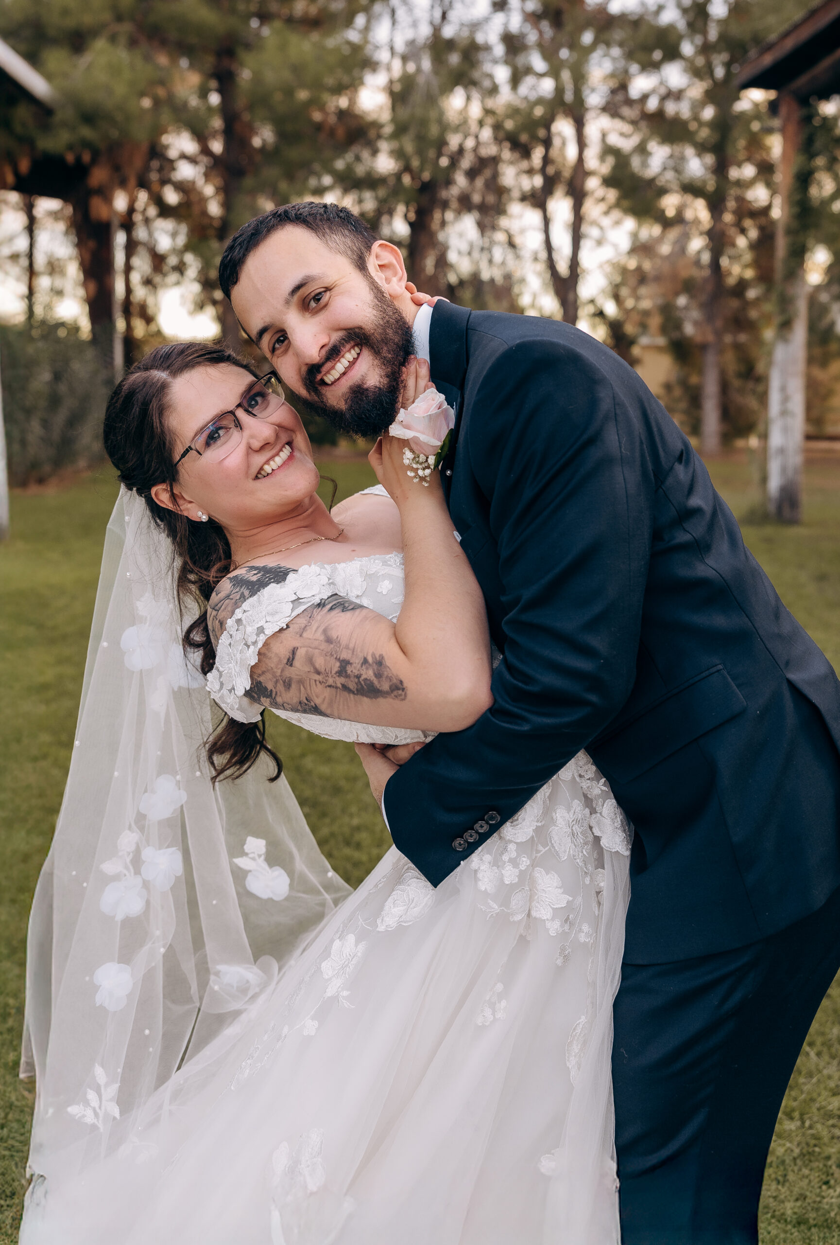 Bride and groom embracing during their Schnepf Farms wedding in Queen Creek, Arizona