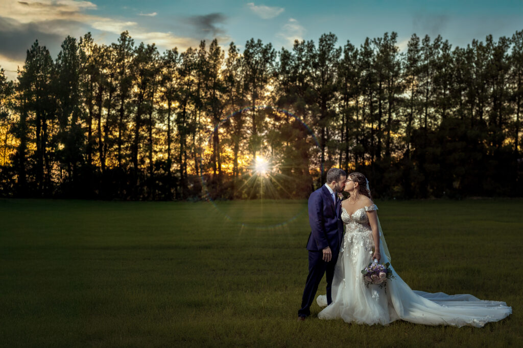 Sunset wedding portrait of bride and groom at Schnepf Farms in Queen Creek, Arizona