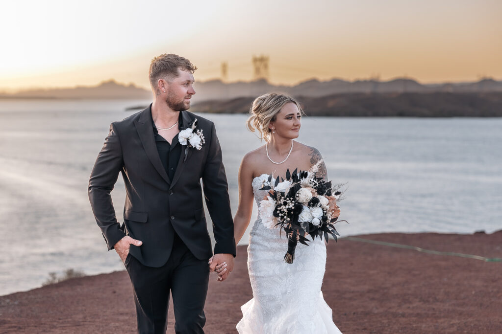 Madison and Caleb at sunset during their Havasu Springs wedding overlooking Lake Havasu