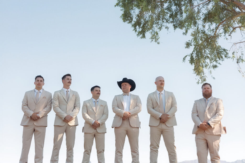 Darren and his groomsmen wear neutral suits for the Lake Havasu wedding.