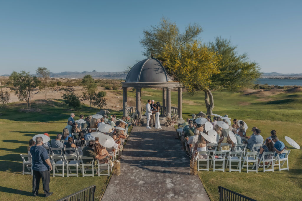 Outdoor Lake Havasu wedding ceremony at The Refuge with Paul and Lizzy beneath the gazebo